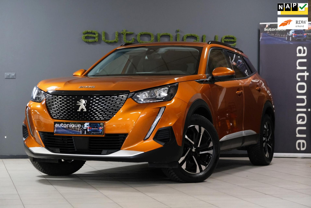 Peugeot 2008 1.2 PureTech Allure |32.685km| Navi/Camera/Stoelverwarming Orange/Black 43430558-0.jpg | AutoNique Occasions Uden