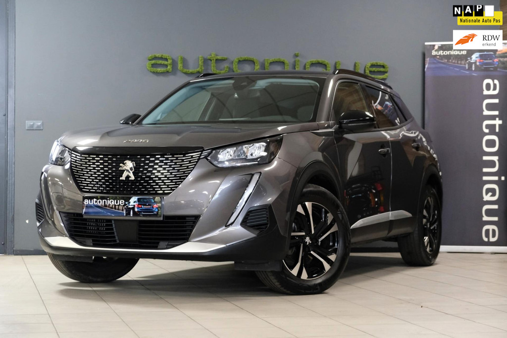 Peugeot 2008 1.2 PureTech Allure |35.204km| *Half Leder/Camera* Meerdere op voorraad 43535565-0.jpg | AutoNique Occasions Uden