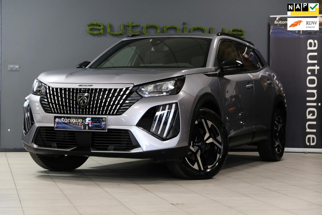 Peugeot 2008 1.2 Hybrid 136 Allure *17.761km* ALS NIEUW Panoramische Camera/Mirror Screen 47570492-0.jpg | AutoNique Occasions Uden