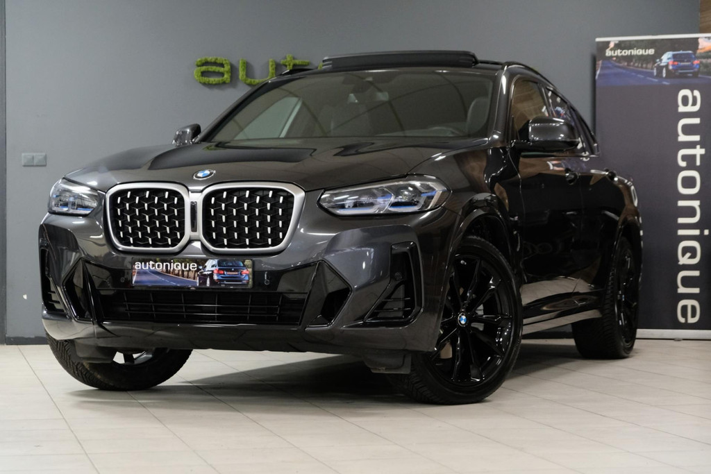 BMW X4 XDrive20i High Executive *M-Pakket* 20dkm LASER/20"/PANO/LEDER |ALS NIEUW| 50961549-0.jpg | AutoNique Occasions Uden